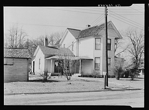 House in the town of Fowler, Indiana, where Tip Estes' employer lives. He rents this house and hires Estes to work one of his farms on a monthly wage basis