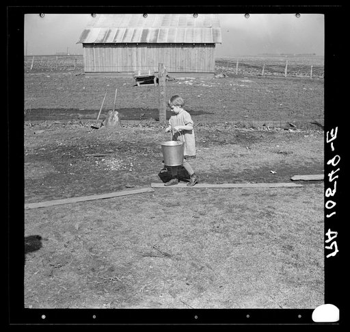 Child of Tip Estes, hired man near Fowler, Indiana, going after water