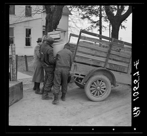 Charles Miller's household goods being moved onto the farm which he is renting northeast of Fowler, Indiana