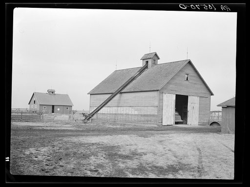 Corncrib and one of the two barns on Roy Conner's owner-operated farm near Templeton, Indiana. This one hundred sixty acre farm is under a small mortgage