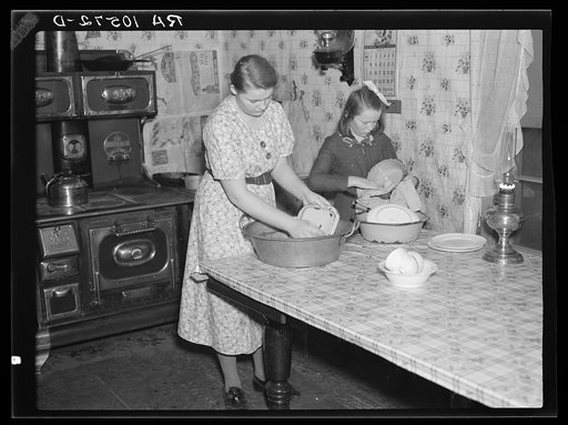 6:30 a.m. One of the Tip Estes' daughters is making the beds. Near Fowler, Indiana