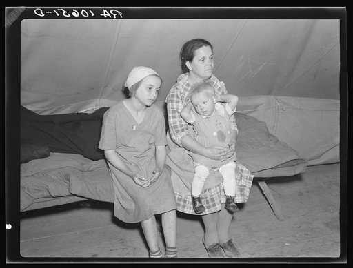 A mother and her children, refugees from the 1937 flood, encamped at Tent City near Shawneetown, Illinois