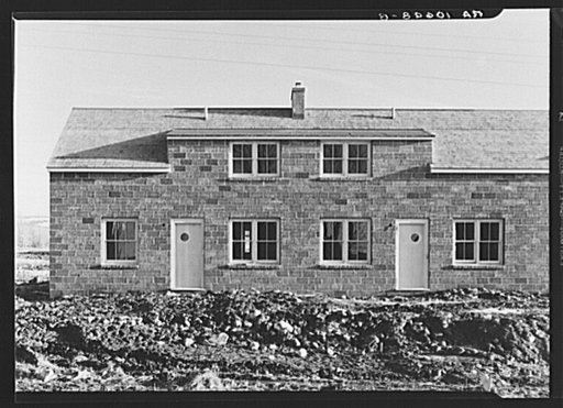 Detail of front of type "F" house under construction at Ironwood Homesteads, Michigan