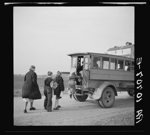 Tip Estes' children boarding a school bus near Fowler, Indiana