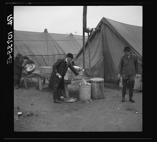 Disposal of garbage and dirty dishes. Tent City, near Shawneetown, Illinois