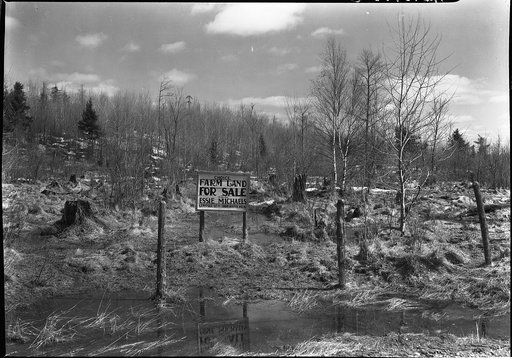 Signboard on land near Iron River, Michigan
