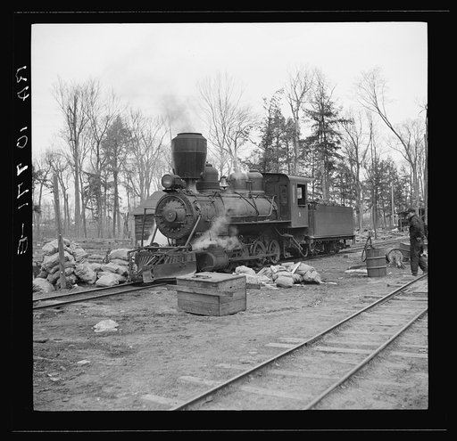 Lumber camp locomotive. Forest County, Wisconsin. Note special smokestack to catch sparks
