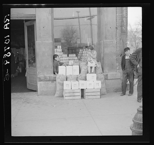 In front of a grocery store. Shawneetown, Illinois