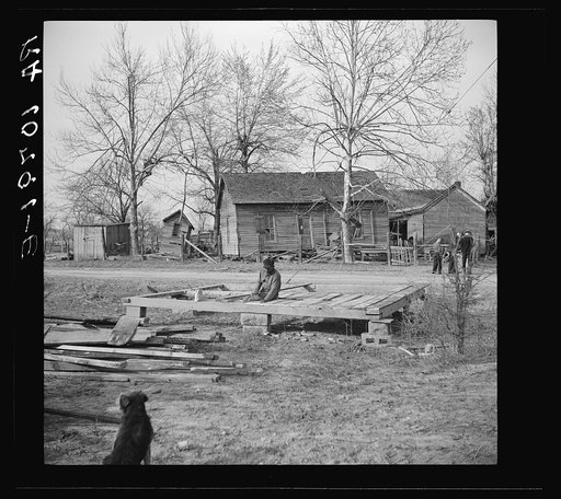 A Negro rebuilding after the flood devastated his home. Shawneetown, Illinois