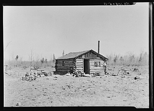 Log cabin occupied by six people. Near Tipler, Florence County, Wisconsin
