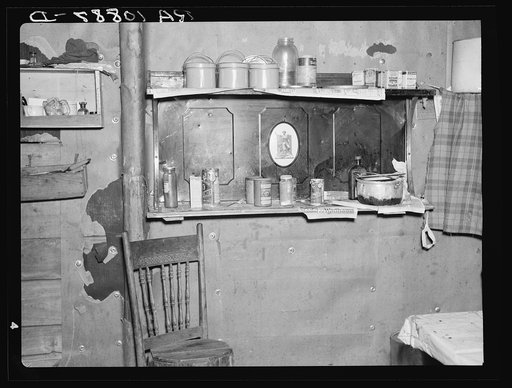 An old kerosene stove adapted to a kitchen cabinet in the home of Max Sparks. Near Long Lake, Wisconsin