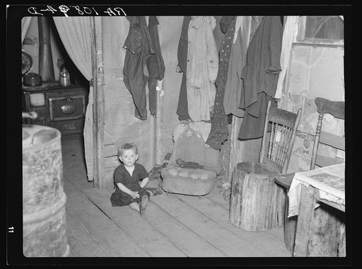 One of Max Sparks' children in their home near Long Lake, Wisconsin. This child is a deaf mute