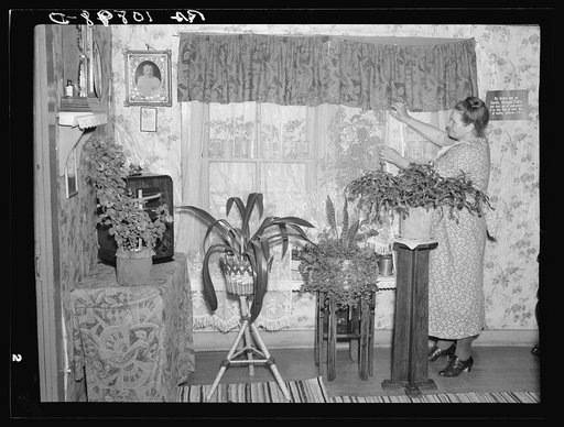 Mrs. Herman Perry in her home at Mansfield, Michigan. She is the wife of an oldtime iron miner who worked in the mines before they were abandoned