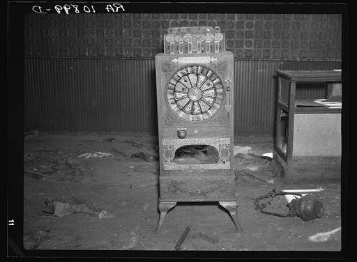 An old slot machine in an abandoned saloon at Mansfield, Michigan