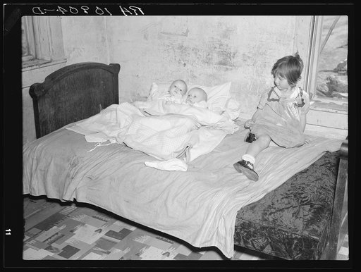 The twins and small daughter of the Stromberg family. Gibbs City, Michigan
