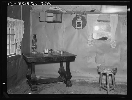The living room of Sherman Ritchie's shack near Iron River, Michigan