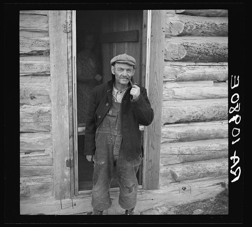 Mr. Bodray in front of his house near Tipler, Wisconsin
