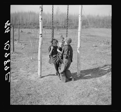 Max Sparks' children playing. The family is destitute with almost a hopeless outlook. Near Long Lake, Wisconsin