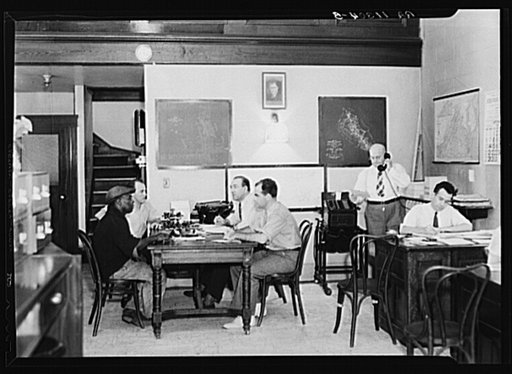 Re-employment service at Newport News, Virginia. Staff director Hornblein in corner at the telephone