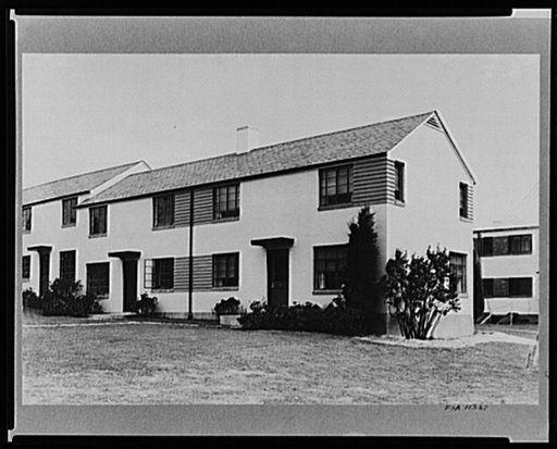 Front and side view of completed dwelling. Greenbelt, Maryland