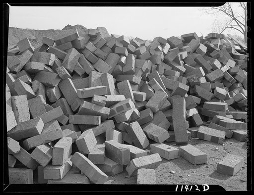 Washington, D.C. Construction of temporary war emergency buildings on the Mall, near 16th and 17th Streets, N.W. Pile of bricks