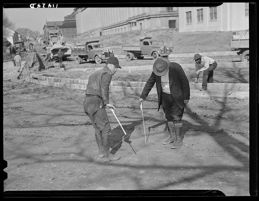 Washington, D.C. Construction of a bridge and road near Independence Avenue and 14th and 16th Streets, S.W. Checking a grade with line and ruler