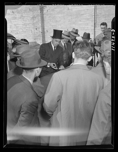 Washington, D.C. Barker demonstrating a trick deck of cards on 9th between E and F Streets, N.W.