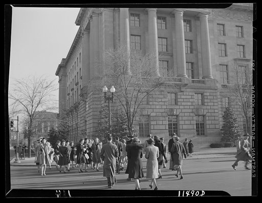 Washington, D.C. Government workers crossing Constitution Avenue at 14th Street