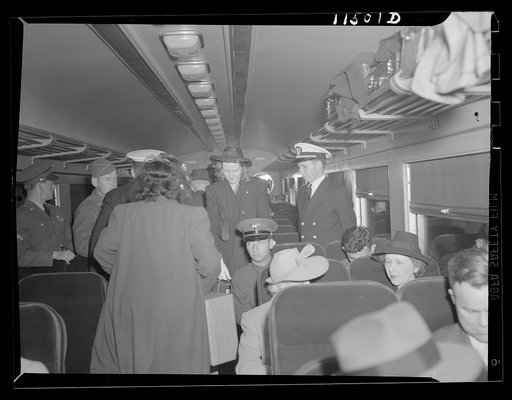 Washington, D.C. People preparing to leave a Pennsylvania Railroad coach