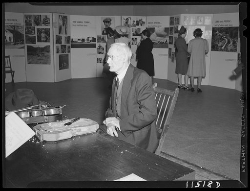 Washington, D.C. Fiddle maker at the crafts display during the National Folk Festival at Constitution Hall
