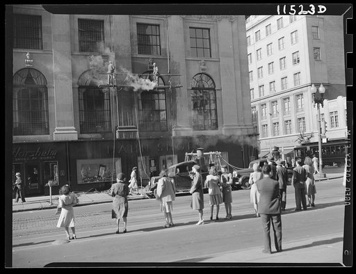 Washington, D.C. Steam cleaning a bank building at 14th and G Streets, N.W.