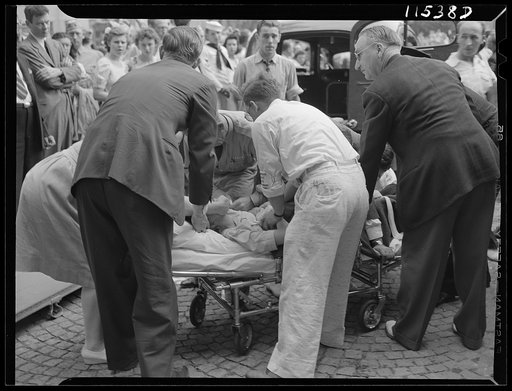 Washington, D.C. First aid had to be administered to this girl who became violent and had to be removed in an ambulance during the Memorial Day parade