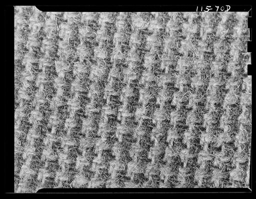 Texture background for motion picture and filmstrip titles. Wool fabric tweed detail
