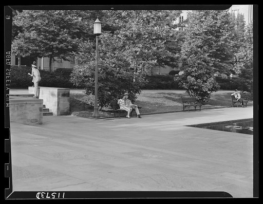Washington, D.C. Rawlins Park. U.S. marine and his girl sitting on a bench