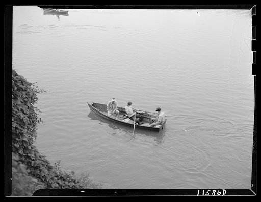 Washington, D.C. (vicinity). Three men in a rowboat on the Potomac River