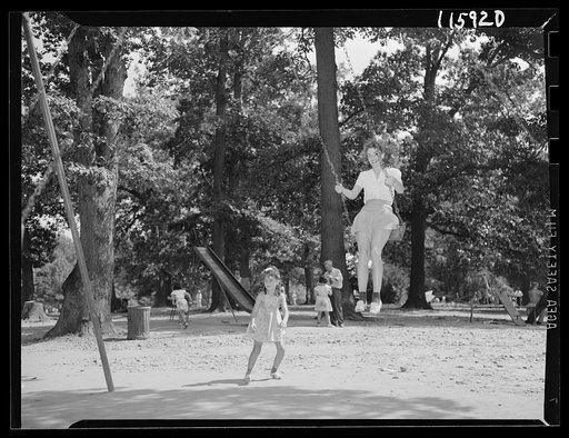 Washington, D.C. Girl in a swing in Rock Creek Park