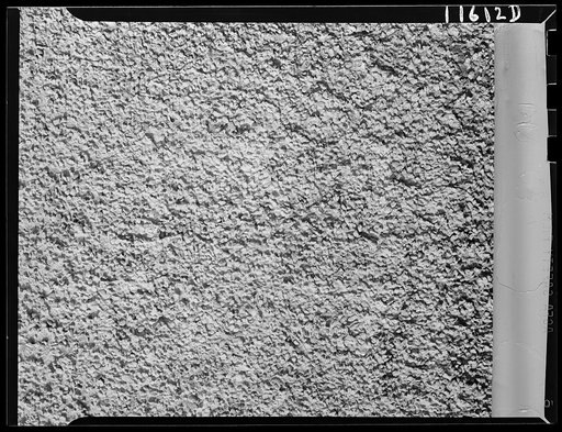 Texture background for motion picture and filmstrip. Pebbled stucco wall