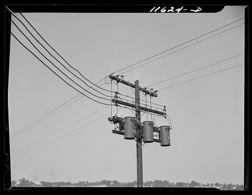 Washington, D.C. Service pole with three transformers hanging from cross arm in Congress Heights, S.E.