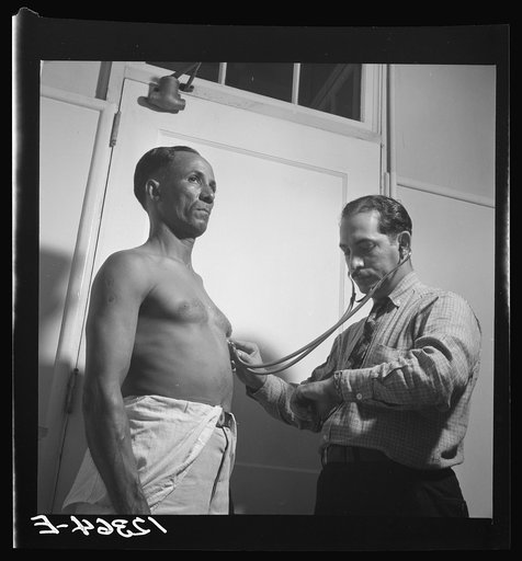 Prospective resident in the Eleanore Roosevelt housing project undergoing medical examination. San Juan, Puerto Rico