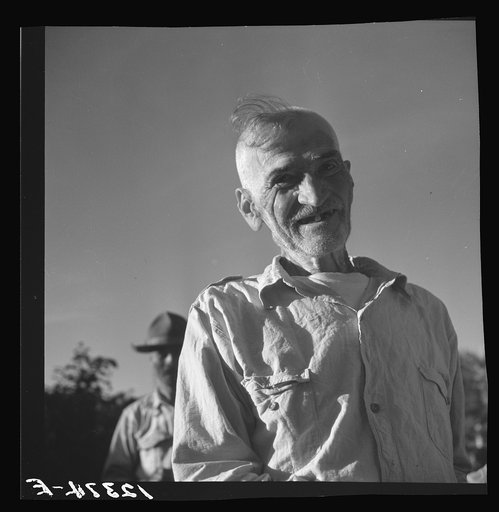 Old "Jibaro," patriarch of a clan of twenty-one tobacco hill farmers. Puerto Rico