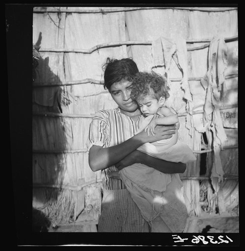 Wife and child of Jibaro tobacco worker near Cidra, Puerto Rico