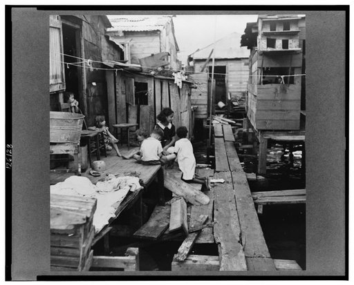 Shacks built over tidal swamp in the workers' quarter of Porta de Tierra. San Juan, Puerto Rico