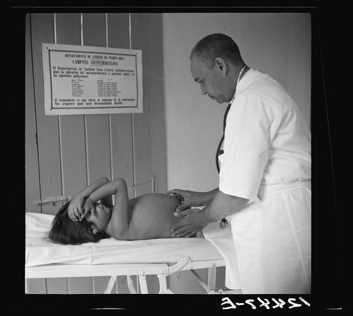 Examination of a child for hookworm in a P.R.R.A (Puerto Rico Resettlement Administration) center, San Juan, Puerto Rico