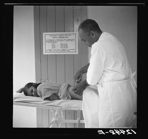 Anti-malarial injection in a P.R.R.A. (Puerto Rico Resettlement Administration) health center. San Juan, Puerto Rico