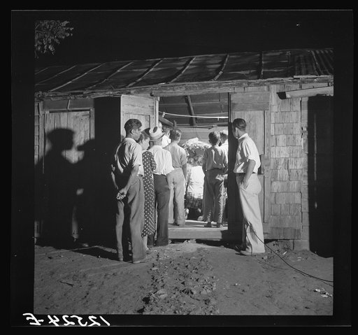 Rosario, a religious ceremony perported to have medicinal properties. A small altar is erected in the hut, all the neighbors came to visit and help in prayer and the singing of hymns. Puerto Rico