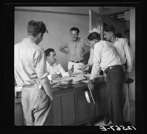 Resettlers being paid for work done on the project. La Plata project. Puerto Rico
