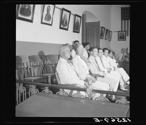 The jury during the trial of Nationalists. Note three empty chairs. Ponce, Puerto Rico