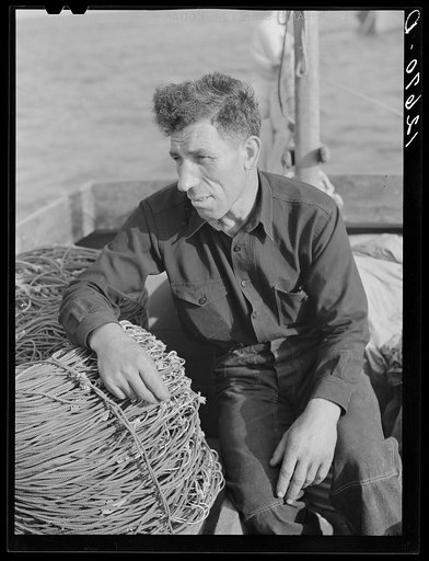 Manuel Zorra, known as one of the best fishermen on the Cape, who in spite of bad fishing conditions, still keeps himself going by running a small boat with a minimum of crew, frequently by himself. Provincetown, Massachusetts