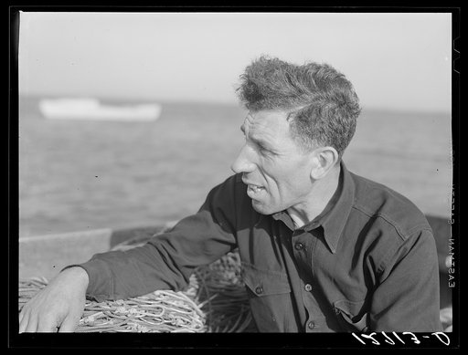 Manuel Zorra, known as one of the best fishermen on the Cape, who in spite of bad fishing conditions, still keeps himself going by running a small boat with a minimum crew, frequently by himself. Provincetown, Massachusetts