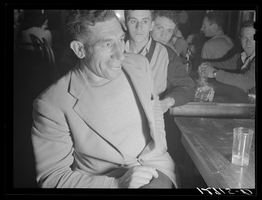 Manuel Zorra, Portuguese fisherman, in a tourist bar and nightclub. Manuel is one of the best storytellers on the cape. Provincetown, Massachusetts